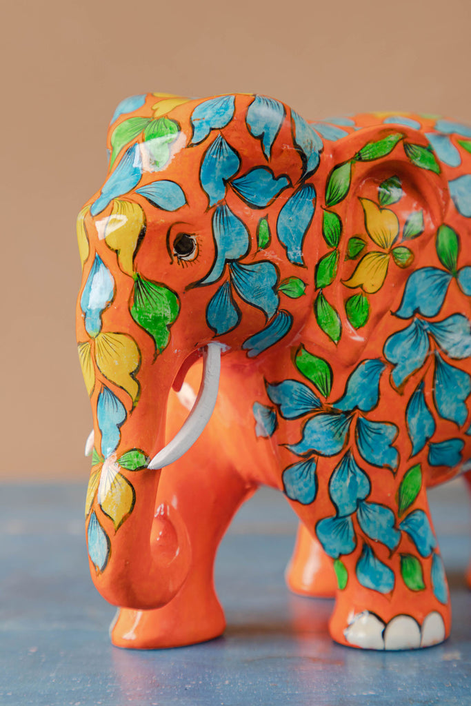 Orange Wooden Elephant with Blue Pottery Work