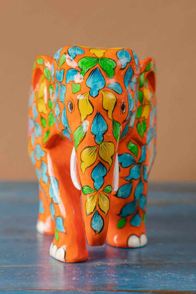 Orange Wooden Elephant with Blue Pottery Work